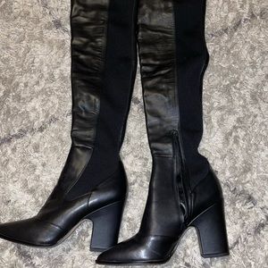 Over the knee leather boots with stretch to them
